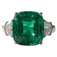 6.56 Carat Colombian Emerald Diamond Three-Stone Ring with Swiss Certification