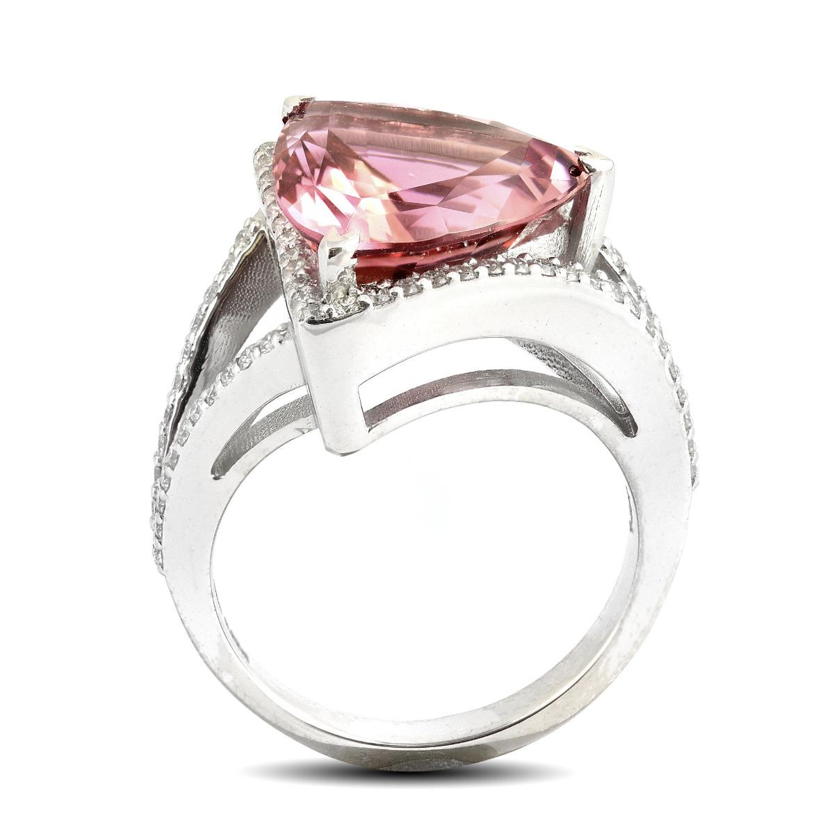 A trillion cut Pink Tourmaline, here is a gemstone that comes with a vivid color and an eye clean appearance. Tourmalines are known for their modern symbolism of love and with the feminine colors of this gem there will be no question about it. Set