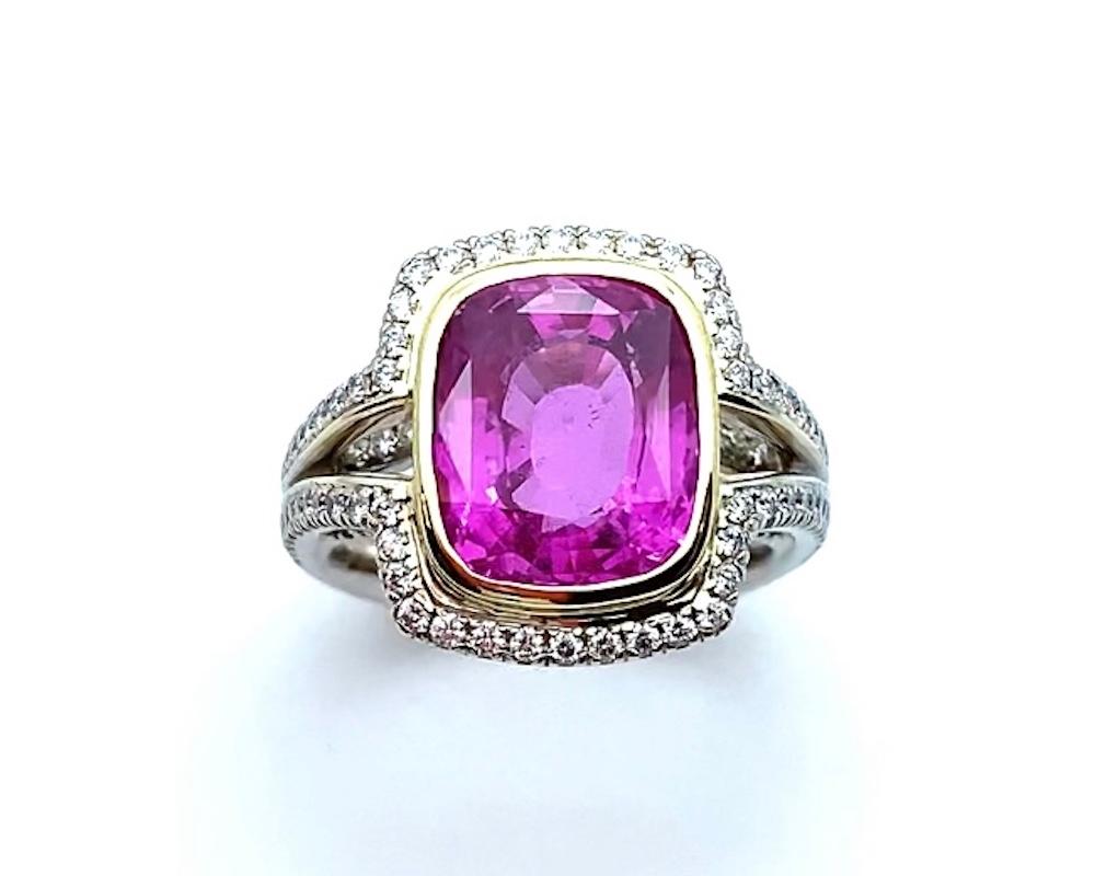 When searching for a top-quality pink sapphire, this is the color to aspire to! This large, vivid pink sapphire possesses an ideal, highly saturated, bright pink hue with beautiful brilliance and life. It is set in a rich, yellow gold bezel,