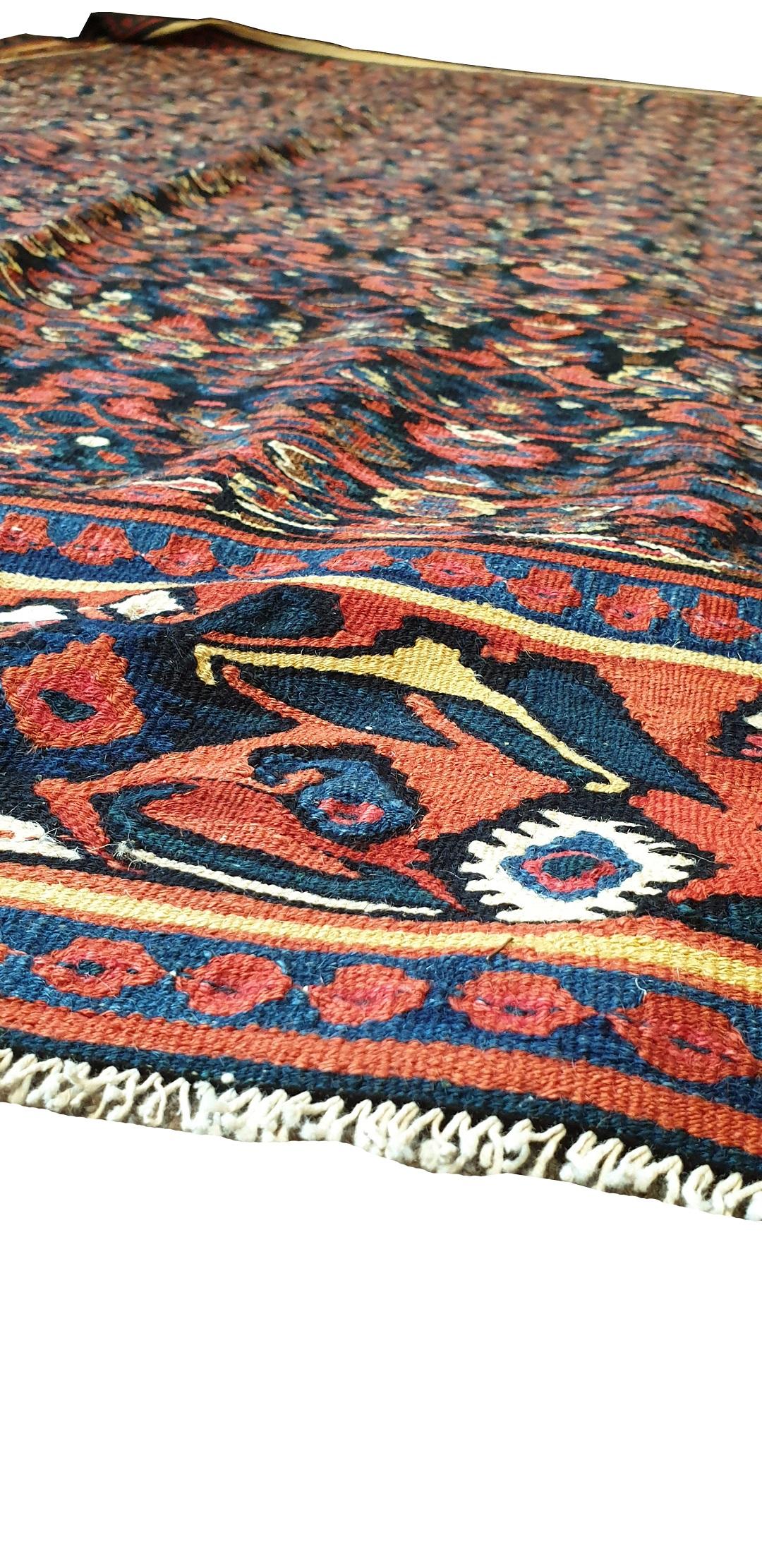 656 - Nice kilim from the end of the 20th century with beautiful patterns and beautiful colors pink, orange, yellow, green and dark blue, entirely hand-woven with wool woven on a cotton foundation.