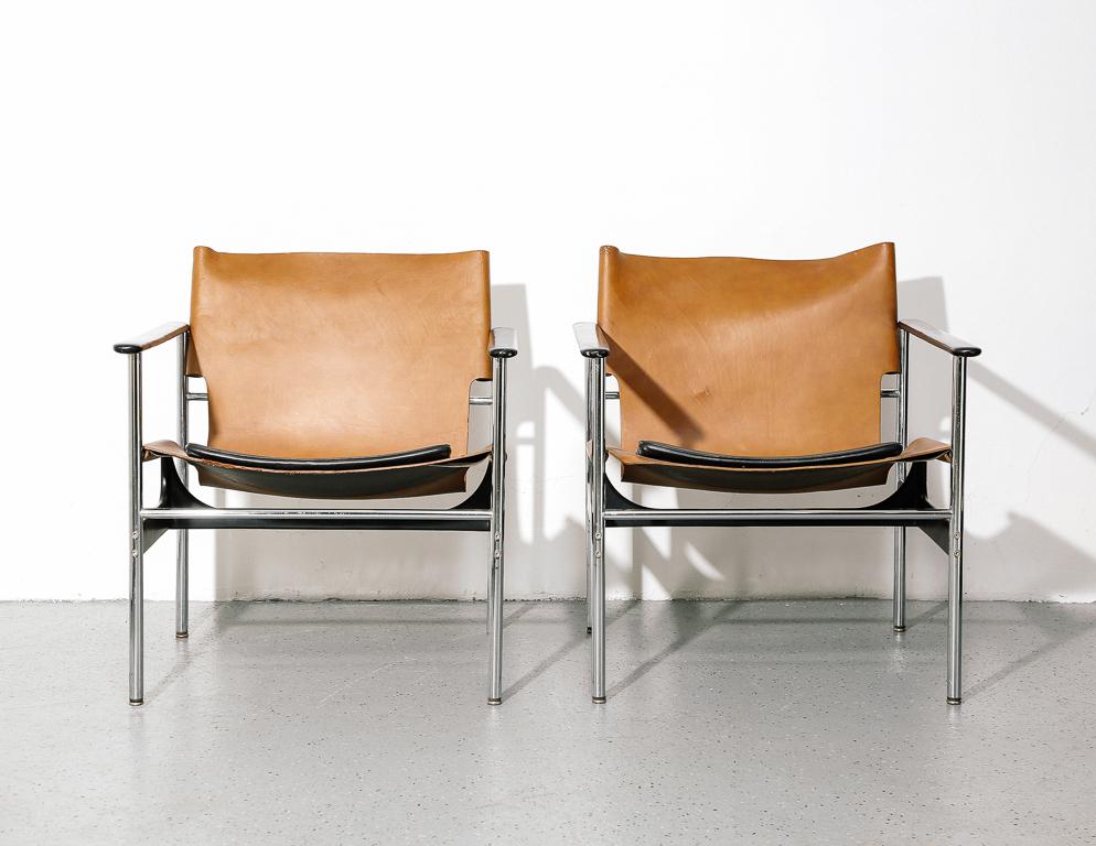 Low armchair by Charles Pollock for Knoll. Tan leather sling with black seat cushion. Chrome tubular frame.

Two available, sold individually.