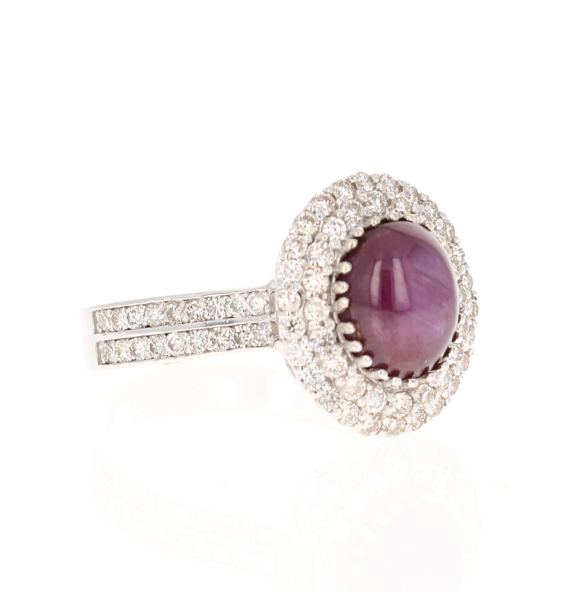 6.57 Carat Non Heated Cabochon Star Ruby Diamond Engagement Ring

Star Ruby Diamond Ring with a Oval Cut Cabochon 5.51 Carat Ruby which is surrounded by 82 Round Cut Diamonds that weigh 1.06 carats. (Clarity: VS, Color: H) The total carat weight of