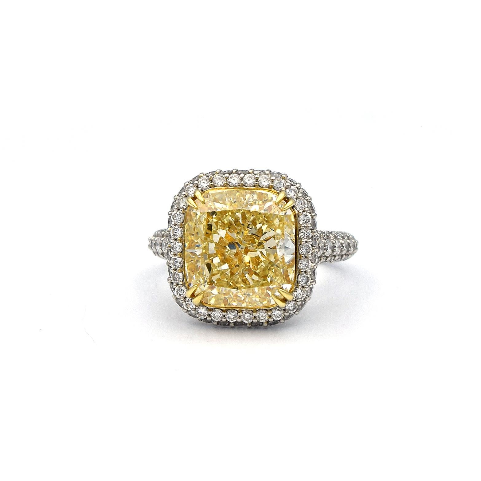 Contemporary 6.58 Carat EGL Fancy Light Yellow Cushion SI2 with Pave Diamonds Platinum Ring For Sale