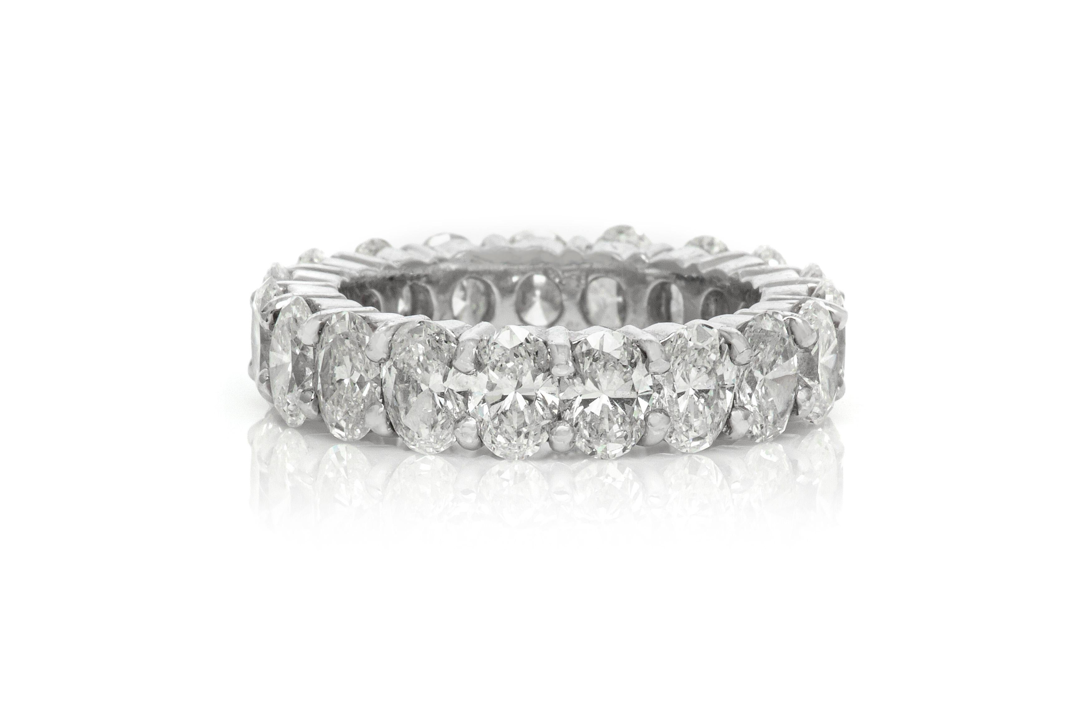 Finely crafted in platinum with 19 Oval cut diamonds weighing a total of 6.58 carats.
Size 6 1/2.