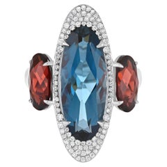 6.58Cts London Blue Topaz, Garnet and Diamond 14Karat White Gold Party Wear Ring