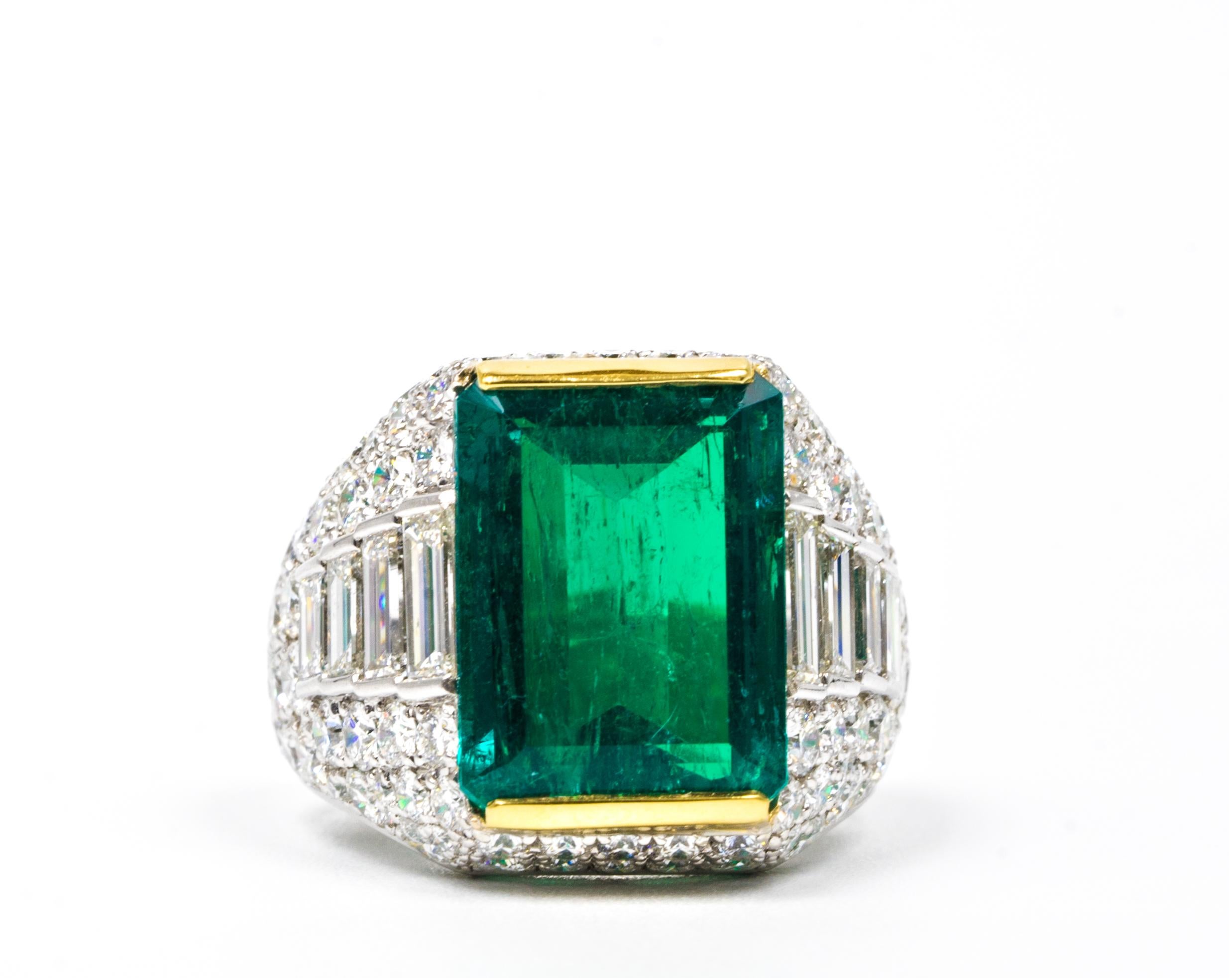 A 6.59 carat Emerald Diamond Ring in Platinum highlighted with 4.79 carats of Round and baguette shaped diamonds.  , D-E color , VVS clarity 
Emerald is Accompanied by AGL certificate number 1080810.


