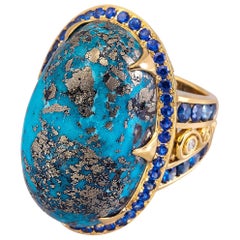 65.95 Carat Oval Turquoise and Sapphire 18 Karat Gold Ring