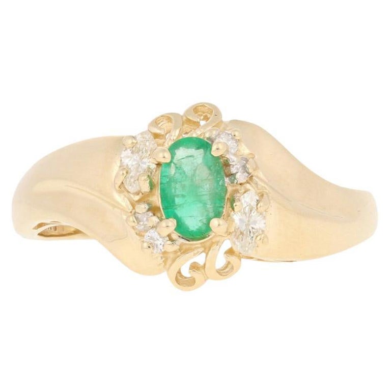 .65ctw Ovalschliff Smaragd & Diamant Ring, 14k Gelbgold Bypass