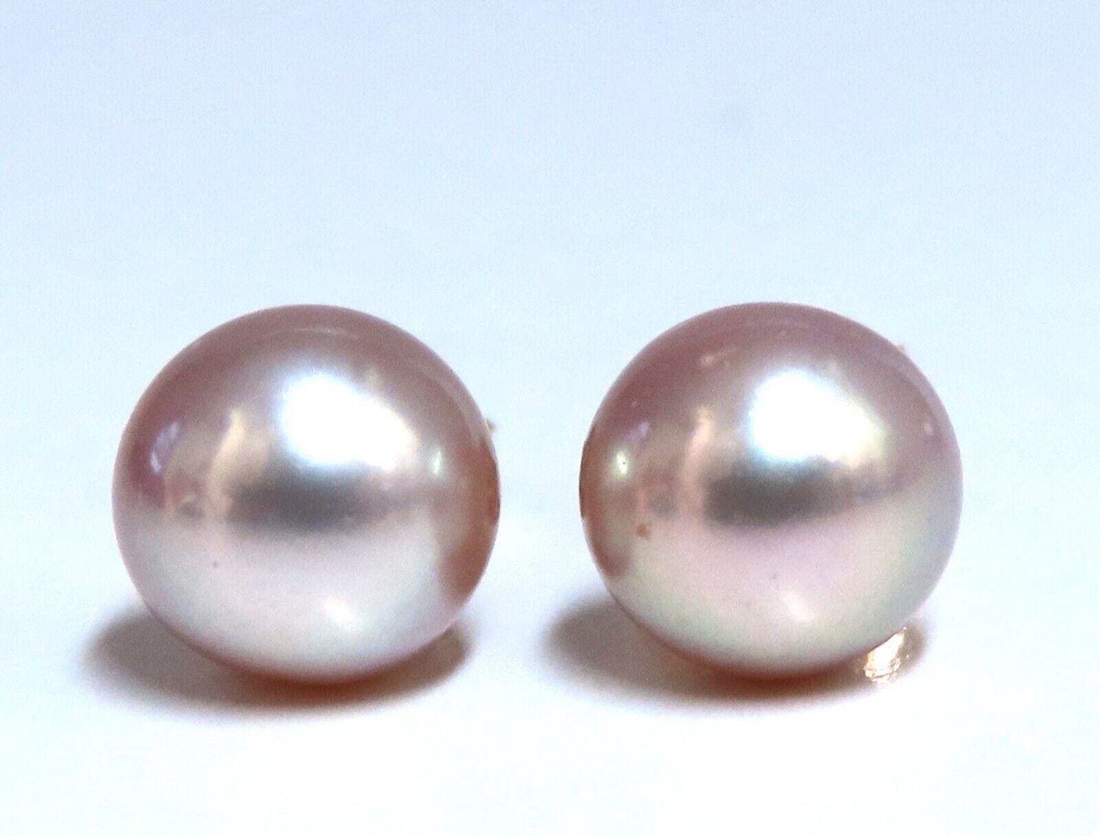 Freshwater Pink Pearl stud earrings.

6.5mm Pearl

14 karat white gold 1 grams

Comfortable Butterfly