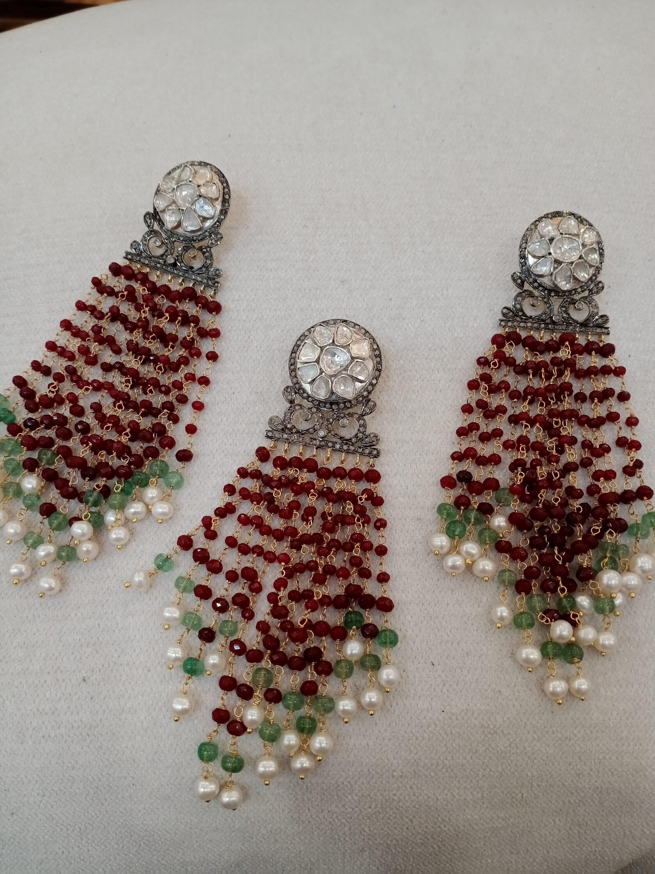 Stunning diamond sterling silver tassel earrings with pendant consists of :

Metal- Silver
Metal Purity- sterling silver
Diamond- Natural uncut diamonds and rose cut diamonds
Diamond origin- Natural earth mined
Diamond weight- 4.70cts
Gemstone-