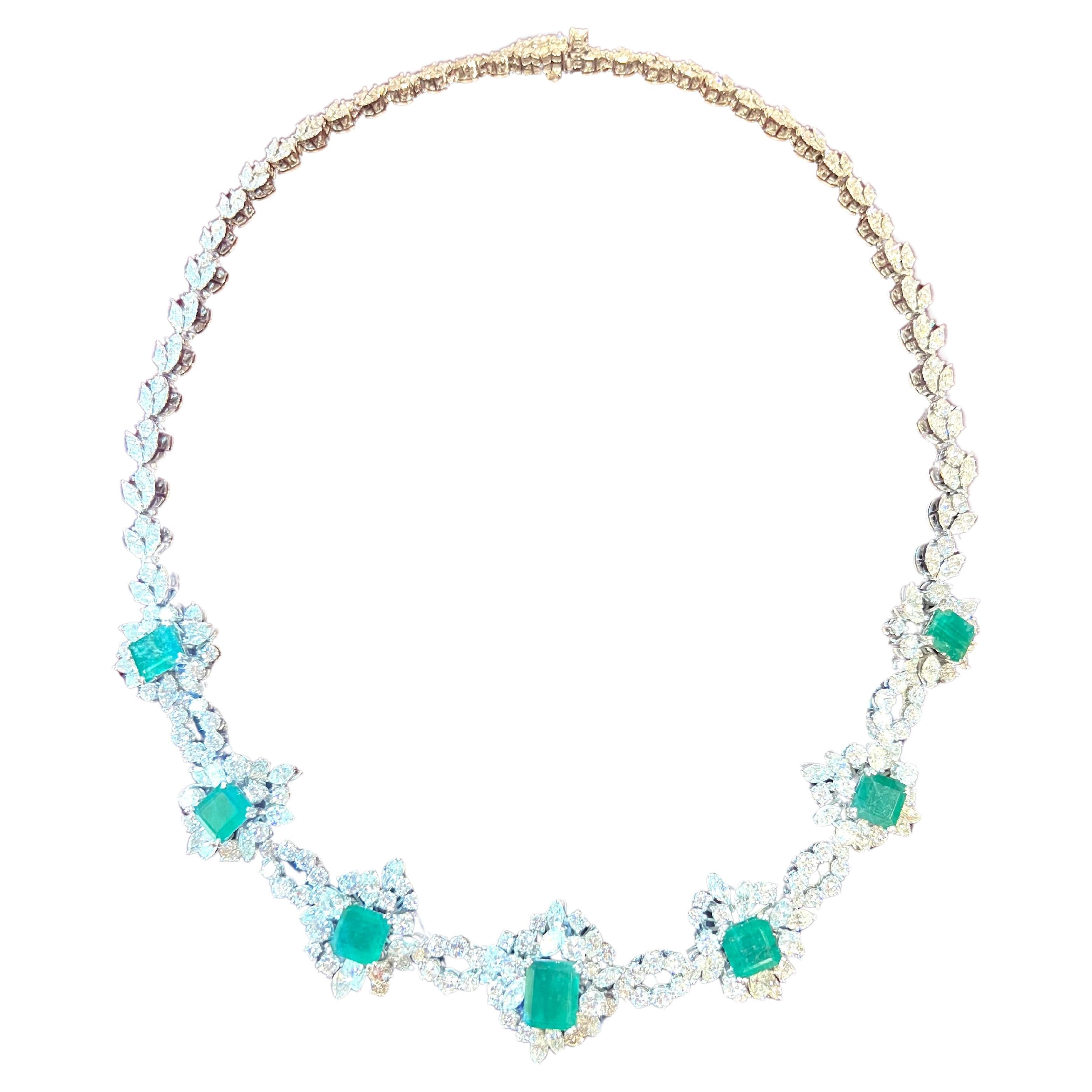 Beautiful and Finely elaborate 65´s Colombian Emerald Necklace in 18k white gold 
- with 7 colombian emerald cut emeralds which total    aproximate 11,5ct
-and 55 natural diamonds marquise cut, colour F-J 
and clarity VS-S1 total 10.72ct 
- and 317