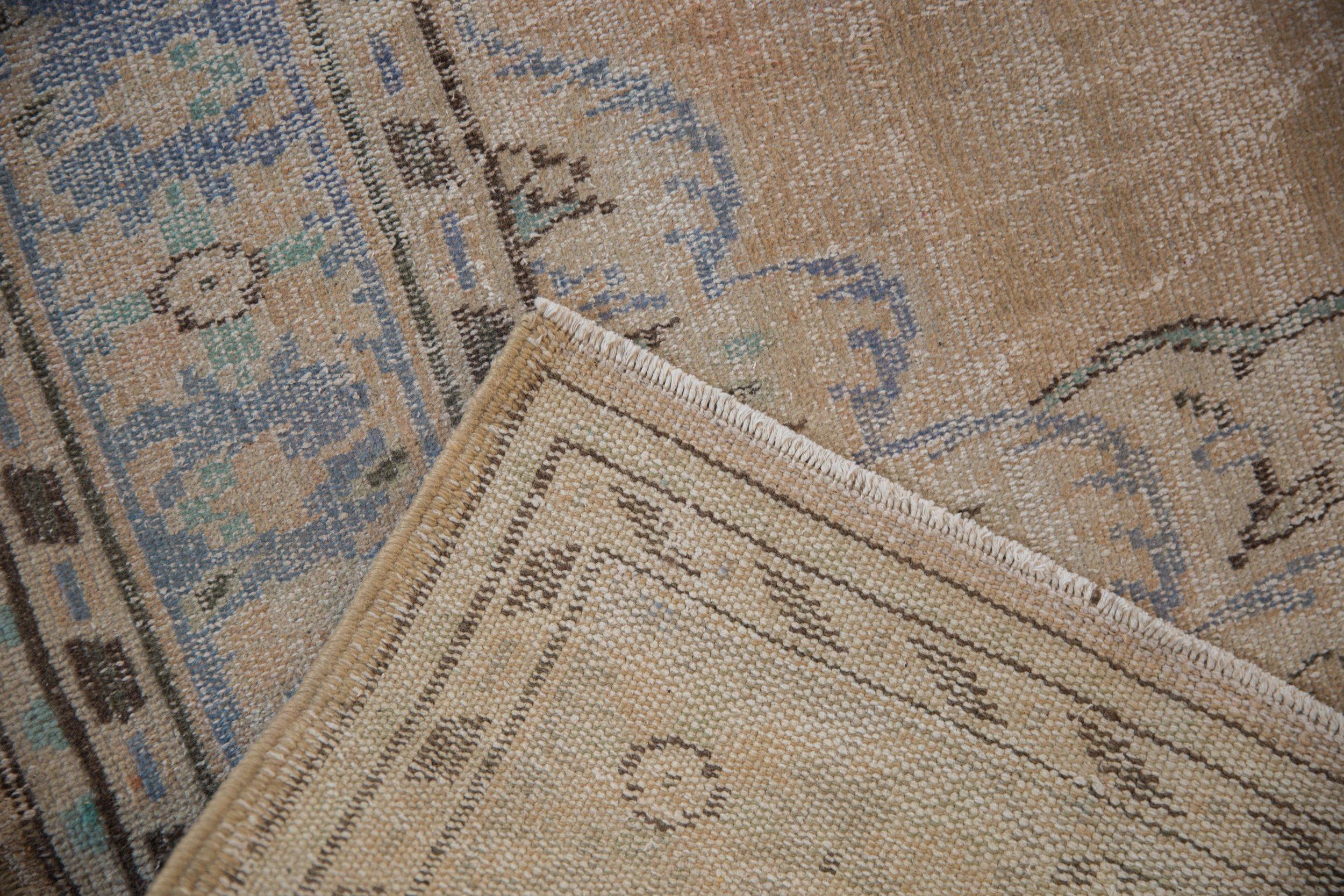 Hand-Knotted Vintage Distressed Oushak Carpet For Sale