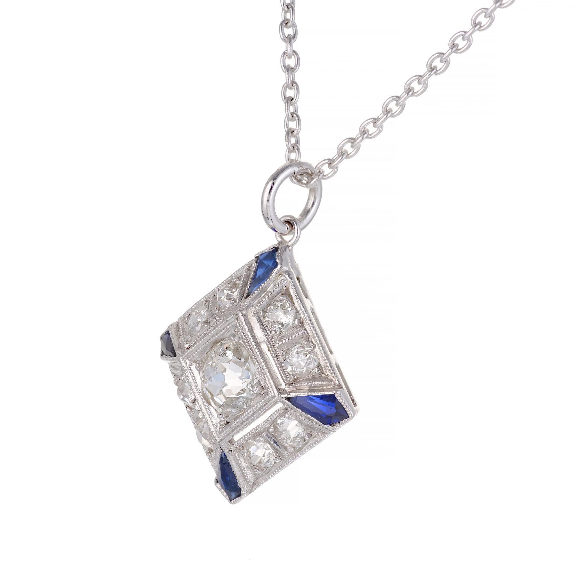 Vintage 1925 old mine cut diamond and kite shaped sapphire pendant. Old mine cut center stone with 8 old mine accent diamonds and 4 kite shaped sapphires on a platinum 16 inch chain.

1 old mine cut diamond, H I approx. .40cts
8 old mine cut