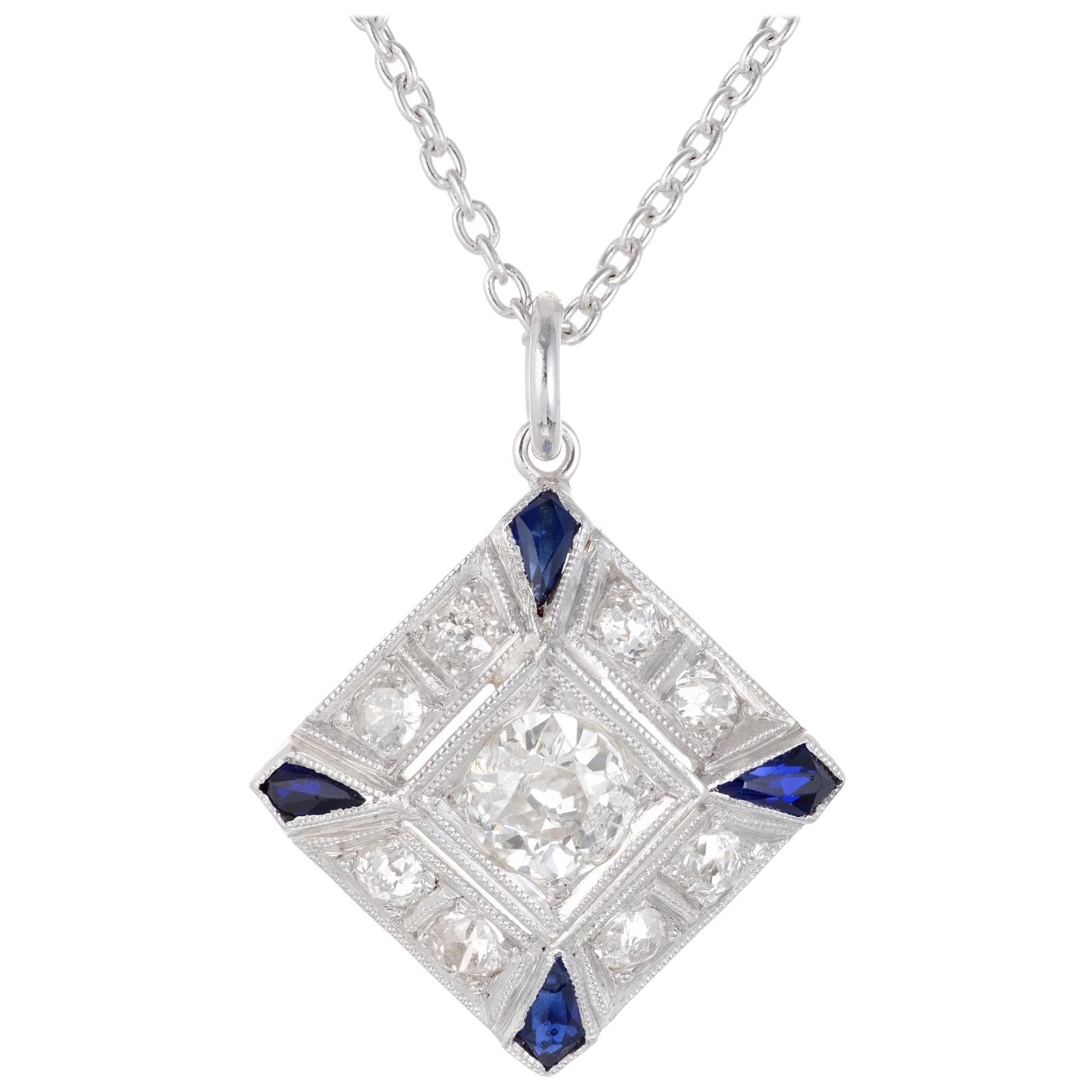 Collier pendentif en platine avec diamants et saphirs bleus de 0,66 carat