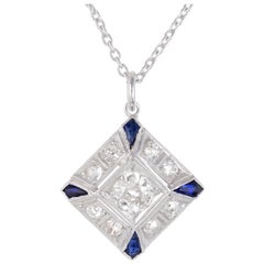 Retro .66 Carat Diamond Blue Sapphire Platinum Pendant Necklace