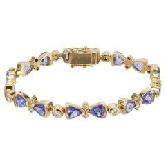 Bracelet en or jaune avec tanzanite triangulaire bleue de 6,60 carats et diamants 