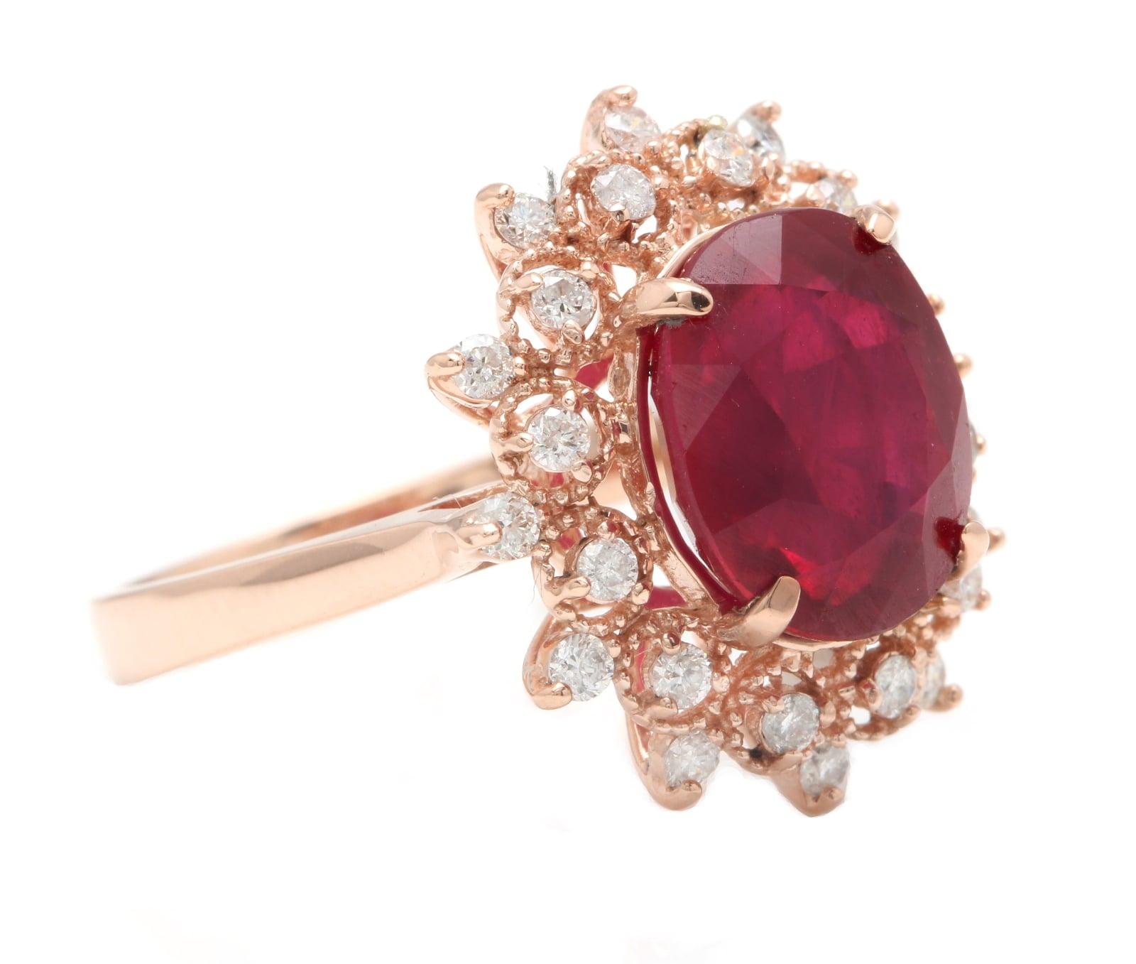 6.60 Carats Impressive Red Ruby and Diamond 14K Rose Gold Ring

Suggested Replacement Value $4,800.00

Total Red Ruby Weight is: Approx. 6.00 Carats (lead glass filled)

Ruby Measures: 11 x 9mm 

Natural Round Diamonds Weight: Approx. 0.60 Carats