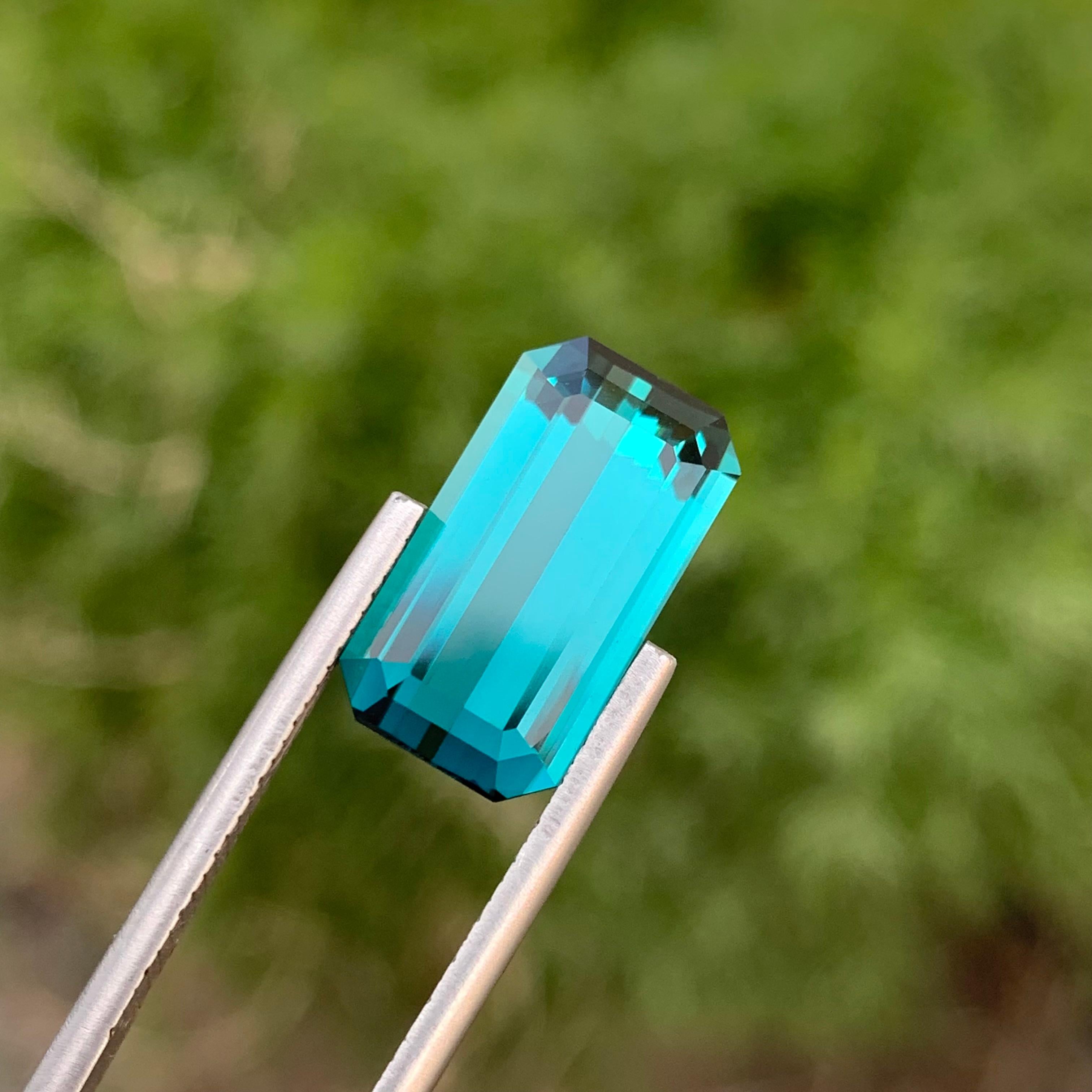 Loose Indicolite Tourmaline 
Weight: 6.60 Carats 
Dimension: 15.6x8.7x5.5 Mm
Origin: Kunar Afghanistan 
Shape: Emerald 
Color: Blue
Treatment: Non / Untreated 
Certificate: On Demand
Indicolite tourmaline, a mesmerizing member of the tourmaline