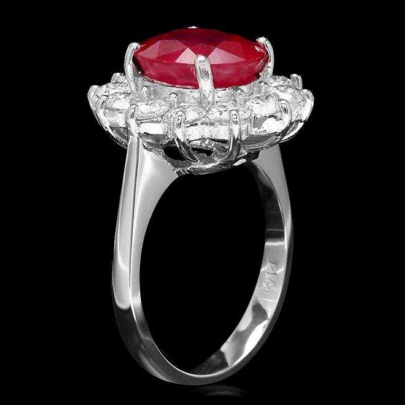 6.60 Carats Natural Red Ruby and Diamond 14K Solid White Gold Ring

Total Red Ruby Weight is: Approx. 5.00 Carats

Ruby Measures: Approx. 11.00 x 9 mm

Ruby treatment: Fracture Filling

Natural Round Diamonds Weight: Approx. 1.60 Carats (color G-H /