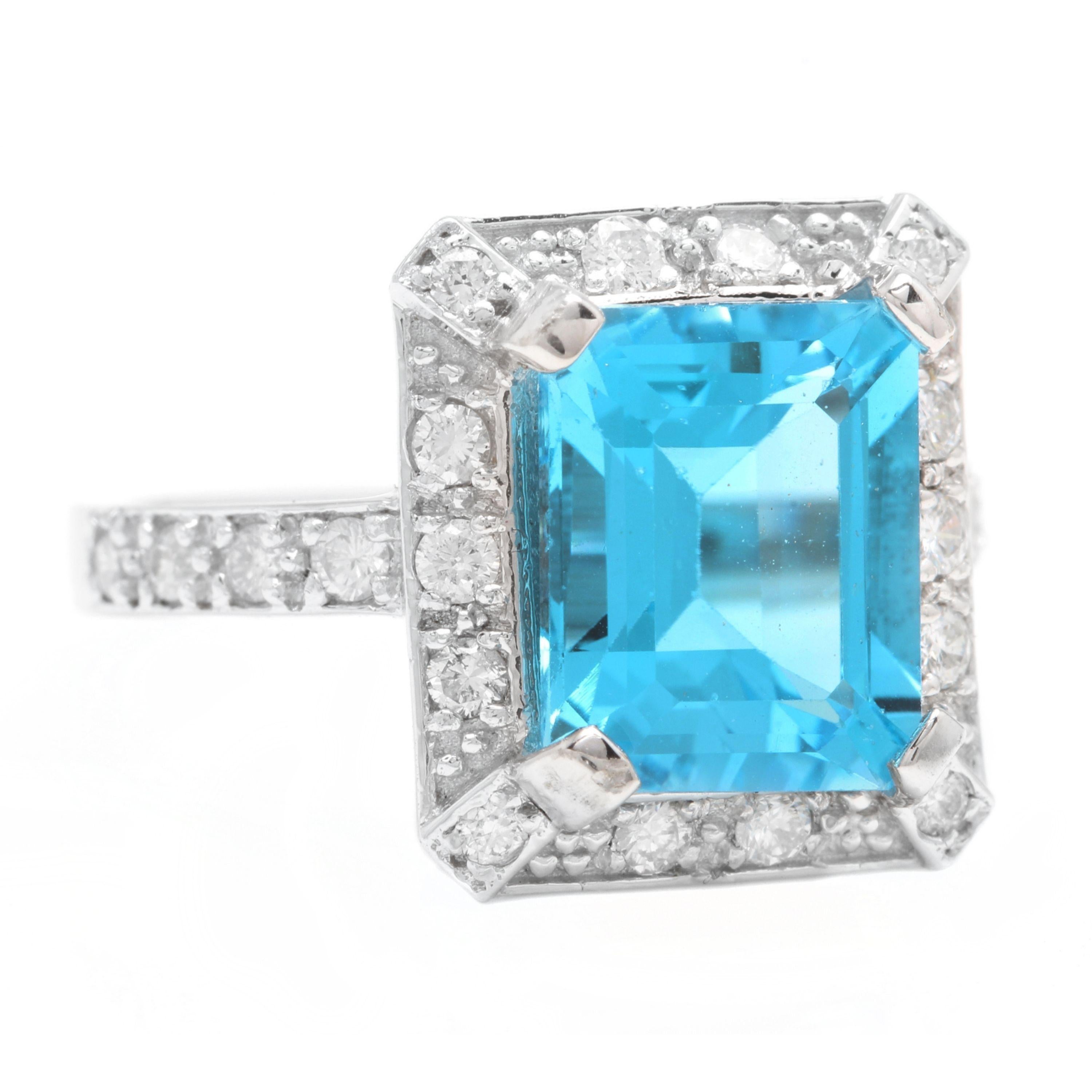 6.60 Carats Impressive Natural Swiss Blue Topaz and Diamond 14K Solid White Gold Ring

Total Swiss Topaz Weight is: Approx. 6.00 Carats

Topaz Treatment: Heating

Topaz Measures: Approx. 11.00 x 9.00mm

Natural Round Diamonds Weight: Approx. 0.60