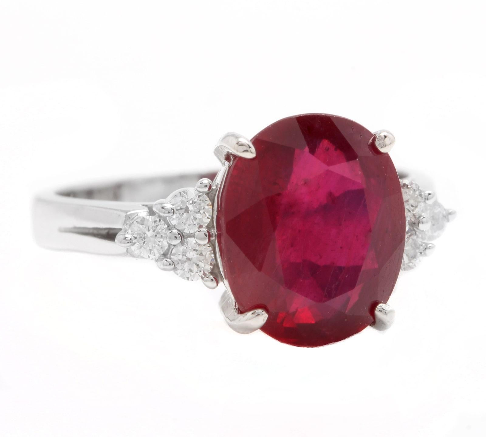 6.60 Carats Impressive Red Ruby and Diamond 14K White Gold Ring

Suggested Replacement Value $4,500.00

Total Red Ruby Weight is: 6.30 Carats 

Ruby Measures: 11x 9mm (Lead Glass Filled)

Natural Round Diamonds Weight: 0.30 Carats (color G-H /