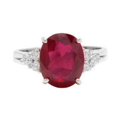 Bague en or blanc massif 14 carats avec rubis rouge de 6,60 carats et diamants