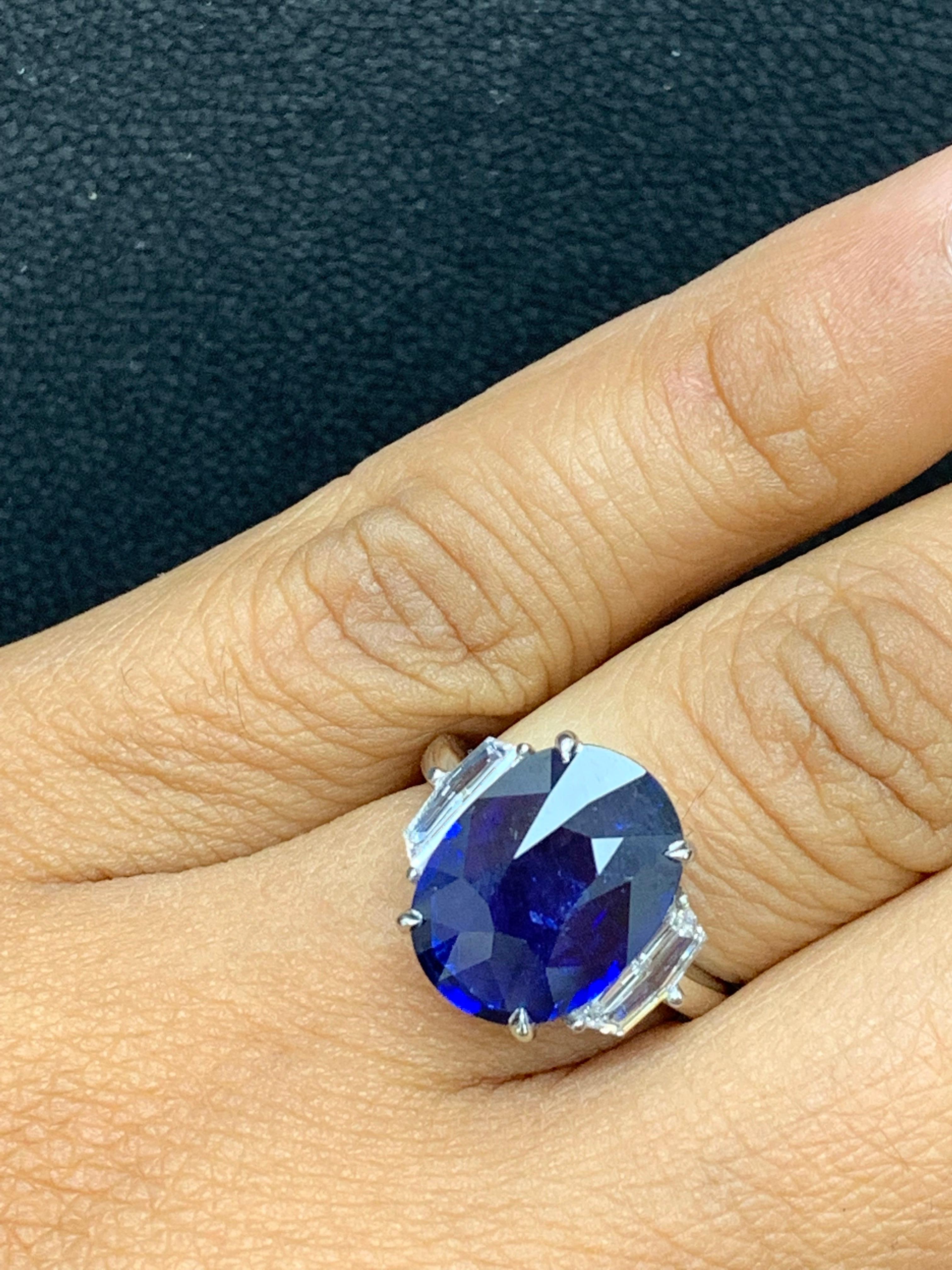 Modern 6.61 Carat Oval Cut Sapphire and Diamond Engagement Ring in Platinum For Sale