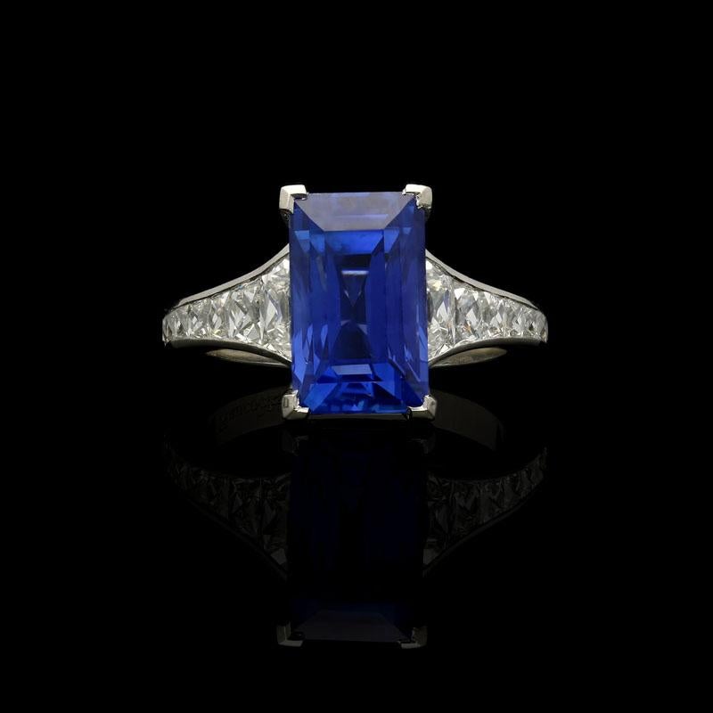 6.61ct rectangular step cut unheated Ceylon sapphire with certificates from GCS and Gubelin.
14 x top grade French cut diamonds weighing a combined total of 1.26cts.
Platinum signed Hancocks
UK finger size M, can be adjusted to your own finger