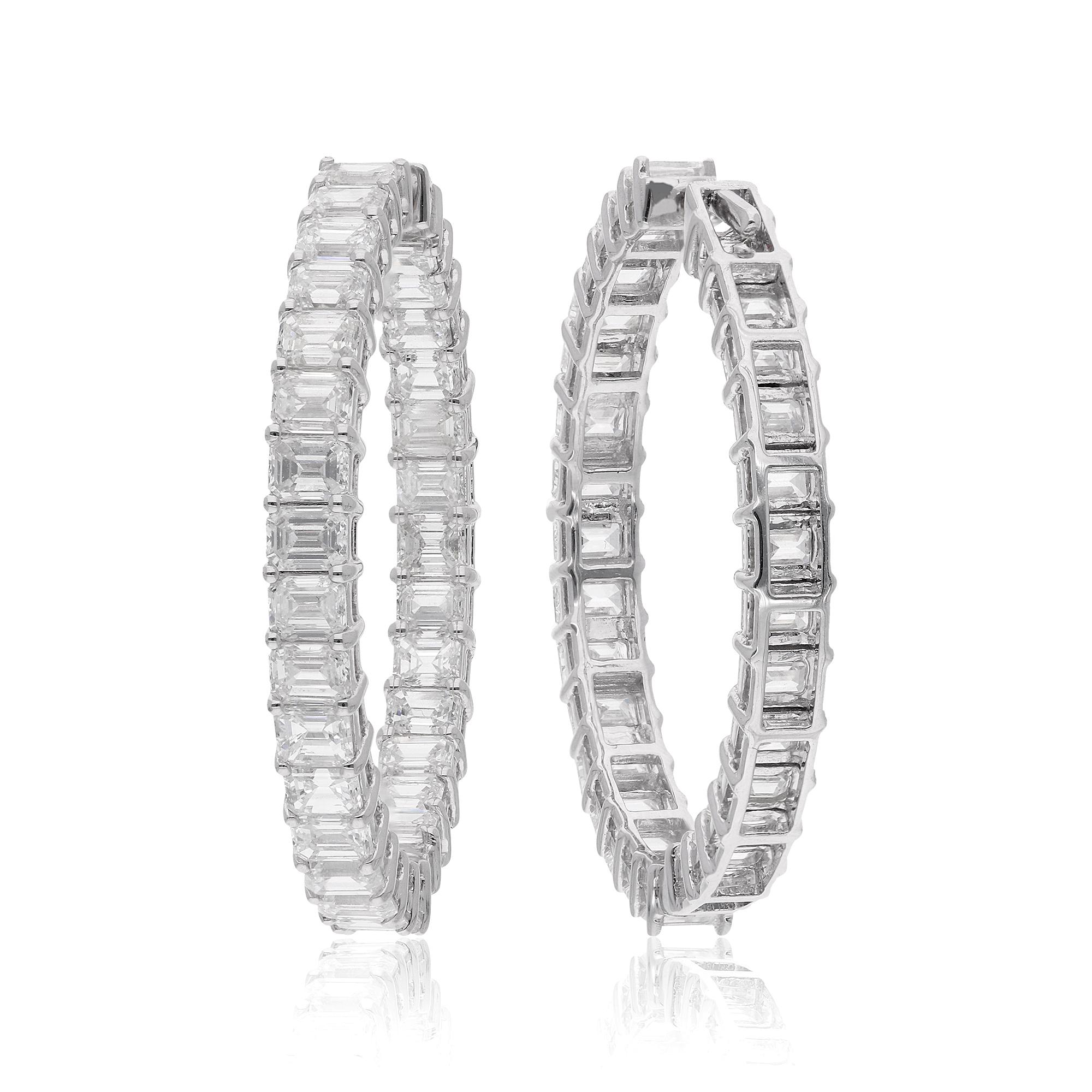 Step into the world of refined elegance with these exquisite 6.62 Ct. Emerald Cut Diamond Hoop Earrings, meticulously crafted in 18 Karat White Gold. Each earring is a masterpiece of artistry and sophistication, handmade with precision to elevate