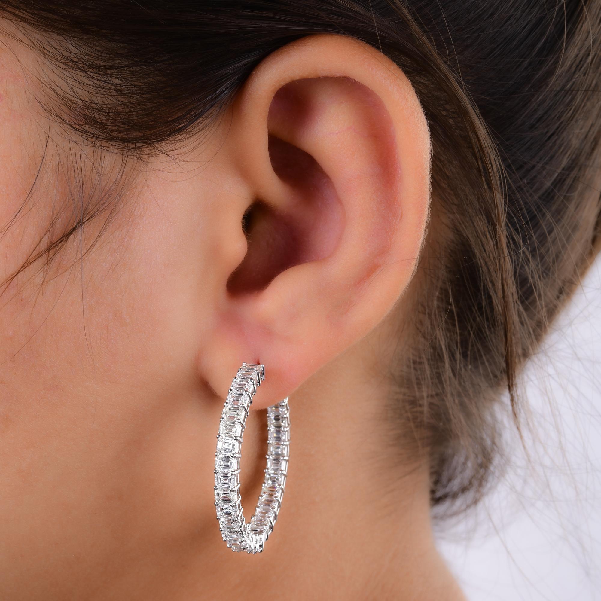 Step into the world of refined elegance with these exquisite 6.62 Ct. Emerald Cut Diamond Hoop Earrings, meticulously crafted in 18 Karat White Gold. Each earring is a masterpiece of artistry and sophistication, handmade with precision to elevate