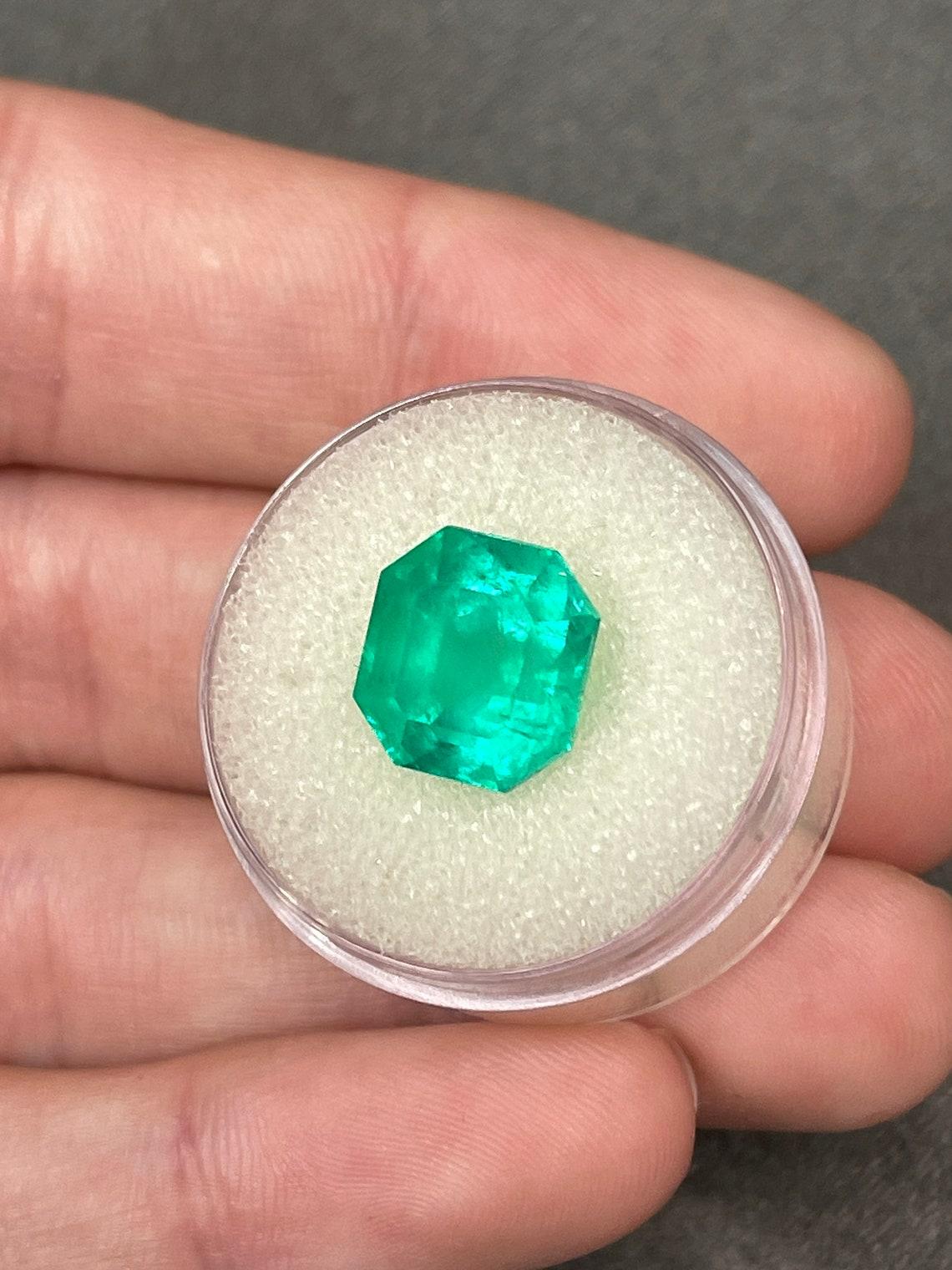 Stone: Emerald
Weight: 6.62-carats
Shape: Asscher Cut
Clarity: Transparent
Luster: Very Good
Color: Intense Medium Green
Measurements: 11.27mm x 10.4mm
Geographic Origin: Colombia
Treatment: Natural, Oiling

Comments: Due to their growth conditions