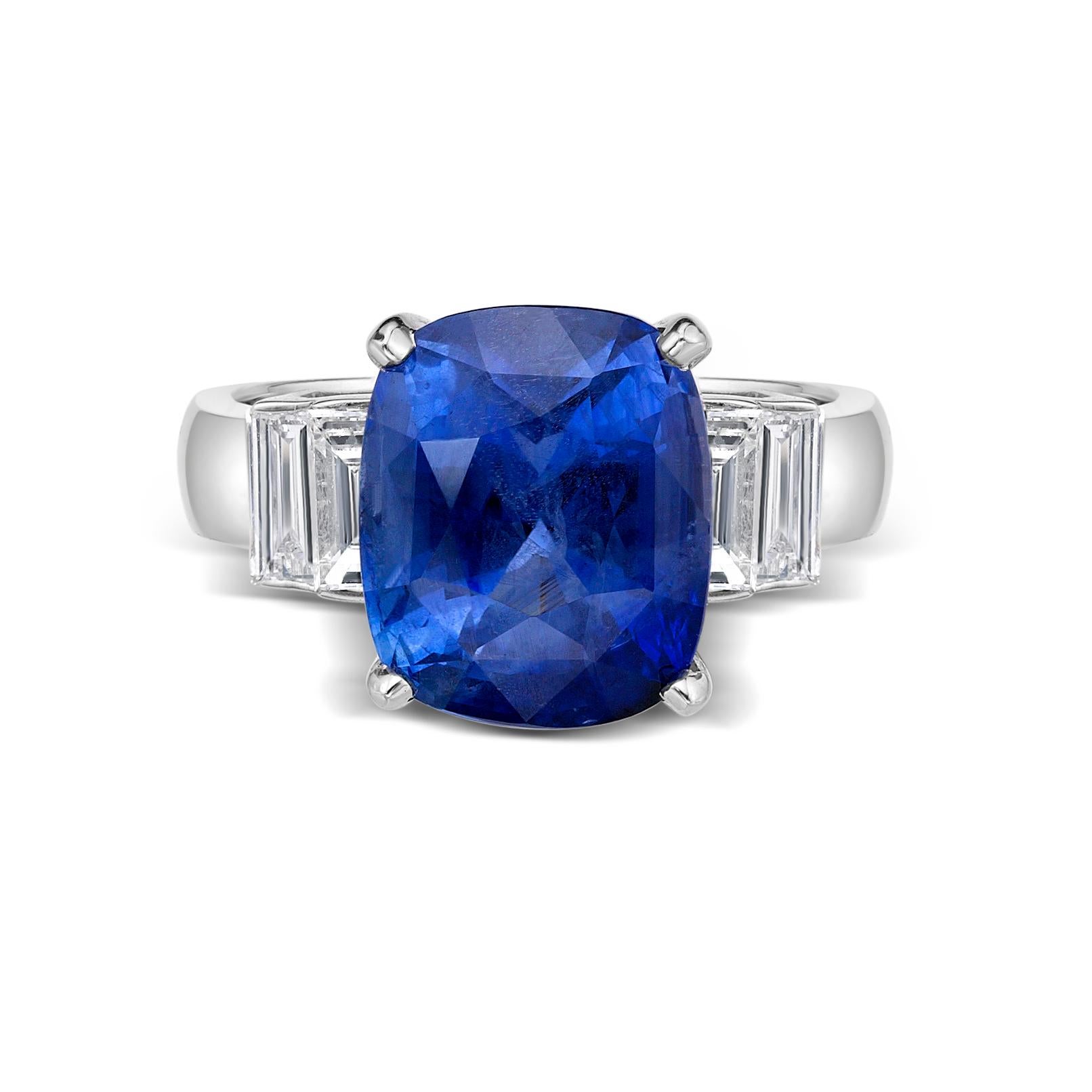 Primary Stone: Sapphire ( Sri Lanka )
Shape : Cushion Cut
Sapphire Weight: 6.63 Carats (1 Sapphire)
Measurements Sapphire: 10.70 mm x 8.92 mm x 7.37 mm
Color: Vivid Blue
Accent Stones: Genuine Diamond
Shape Or Cut Diamond: 4 Baguettes
Average