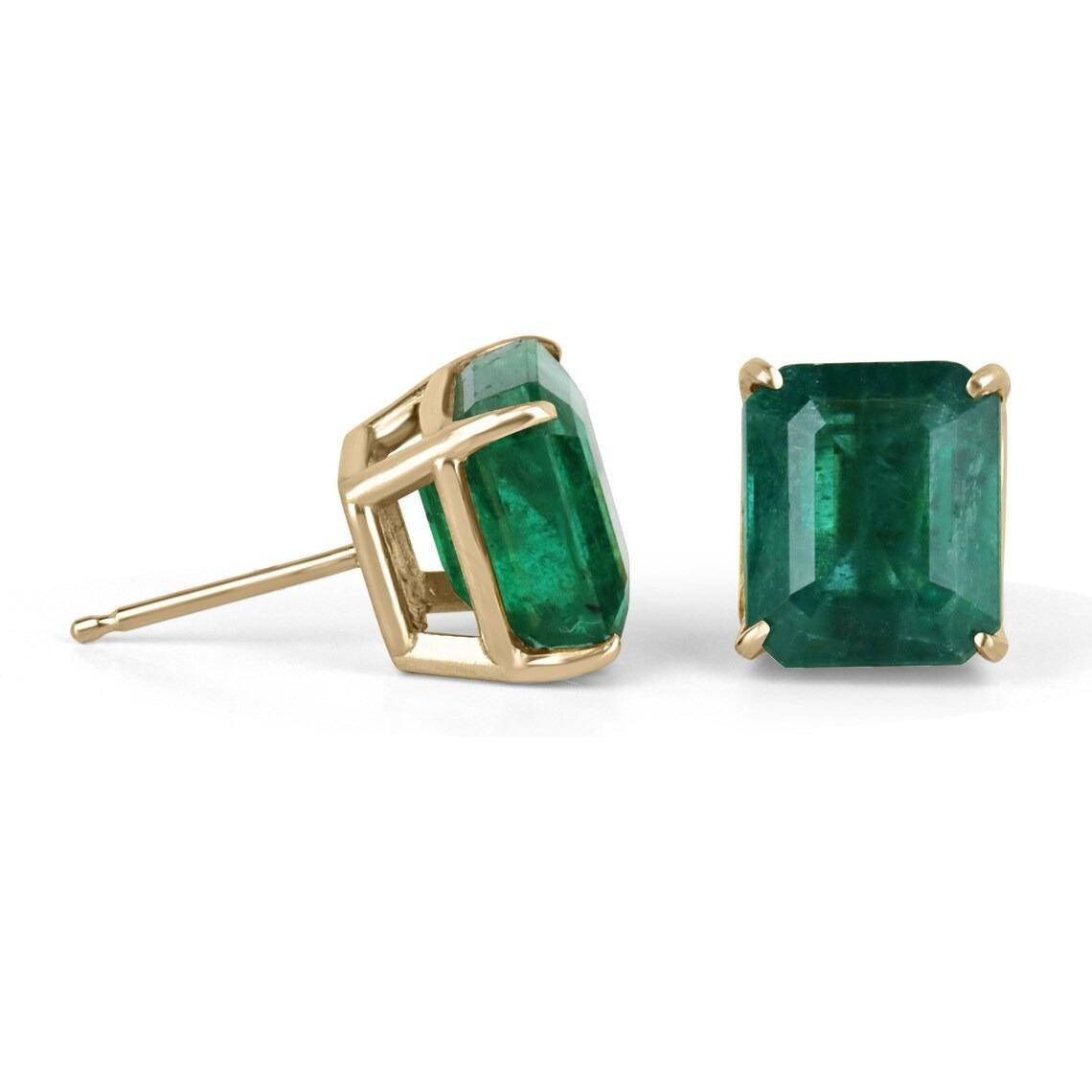These natural emerald cut emerald stud earrings are a true statement piece. The emeralds are of exceptional quality, with a total weight of 6.63 carats and a dark, rich green color that exudes luxury and sophistication. The emeralds are expertly cut
