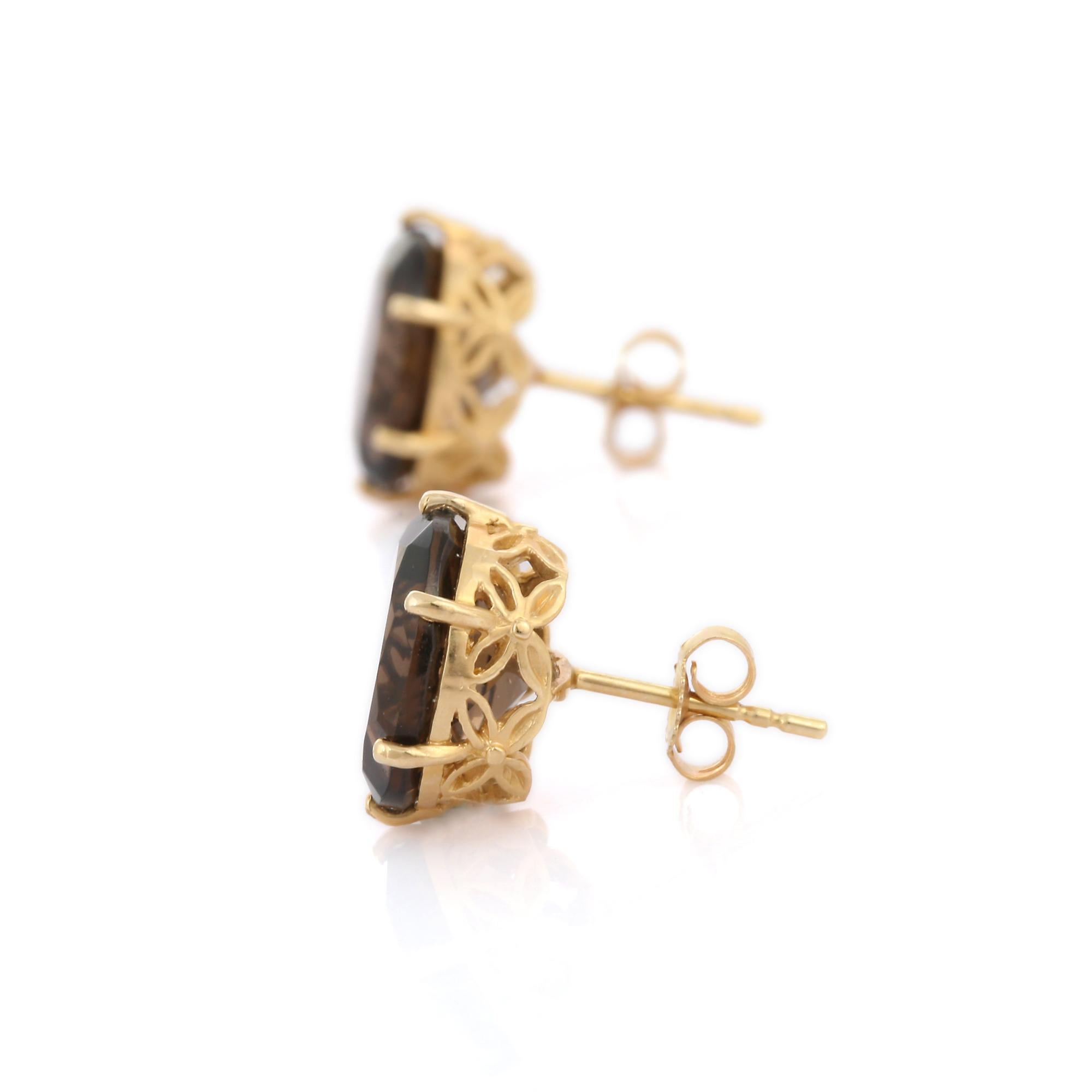 Studs create a subtle beauty while showcasing the colors of the natural precious gemstones.

Oval cut 6.64 ct smoky quartz studs in 14K gold. Embrace your look with these stunning pair of earrings suitable for any occasion to complete your