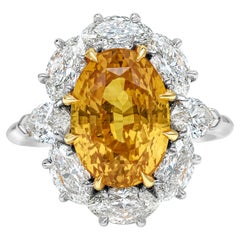 6.64 Carat Oval Cut Orange Sapphire and Diamond Halo Engagement Ring