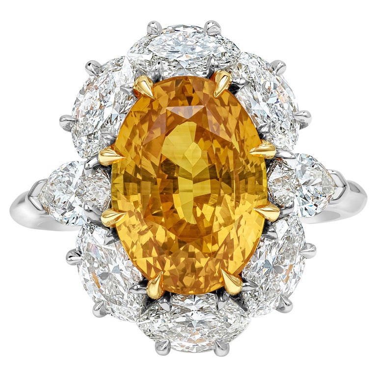 6.64 Carat Oval Cut Orange Sapphire and Diamond Halo Engagement Ring For Sale
