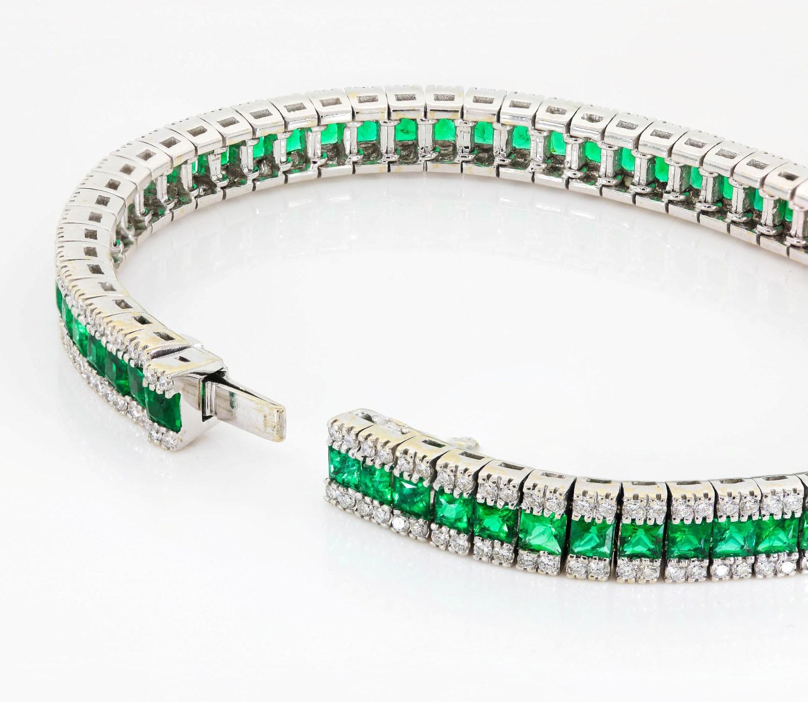 This stunning Italian made bracelet centers a row of resplendent French cut Colombian Emeralds weighing a grand 6.64 carats.  The Emeralds are flanked by two rows of Round Brilliant Cut Diamonds, all weighing 2.25 carats H color - VS clarity.  The