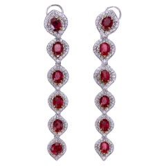 6.64 Carats Oval Cut Ruby Earrings with Diamonds in 18 Karat White Gold