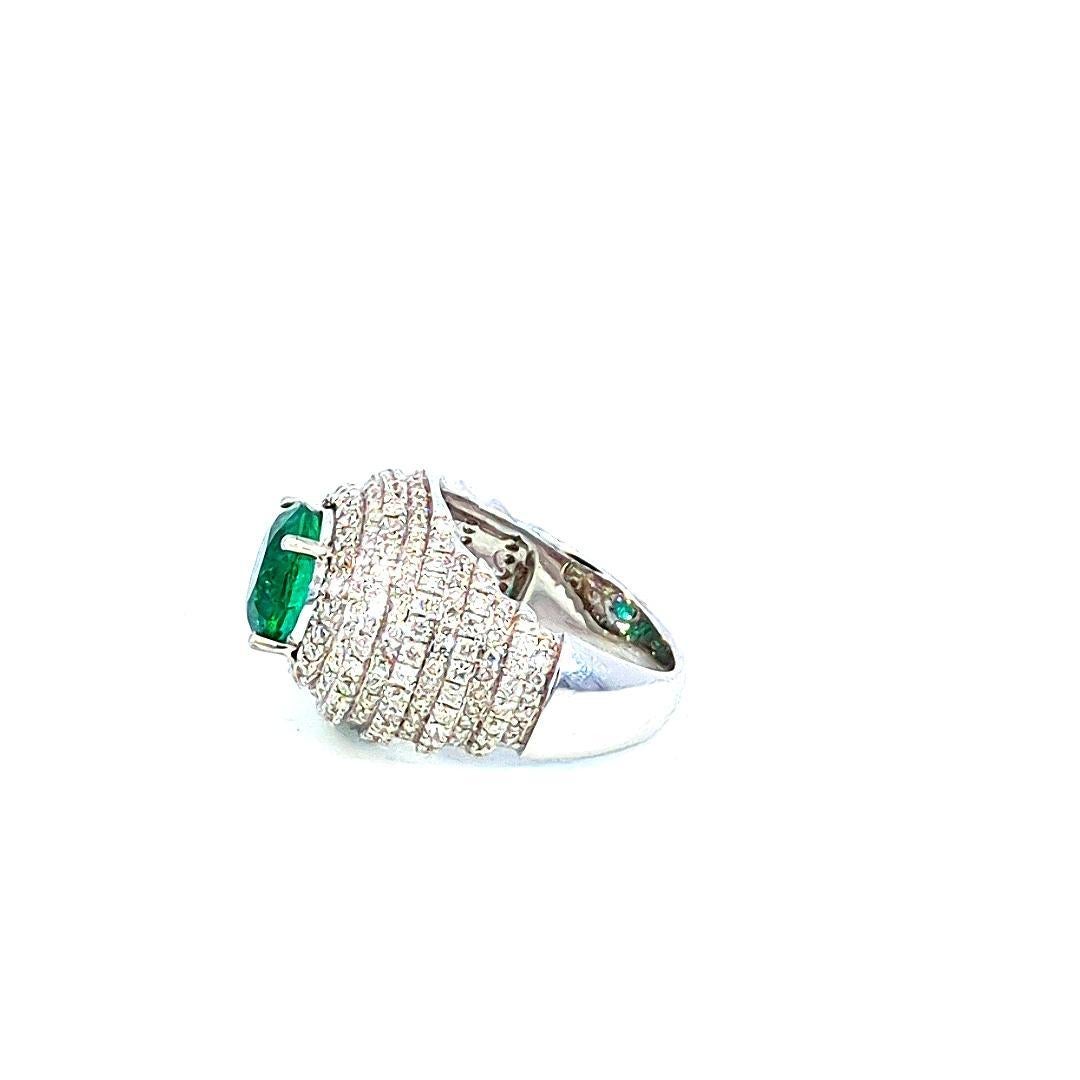 Art Deco 6.65 Carat Emerald And 1.53 Carat Diamond Cluster 18K Gold Ring For Sale