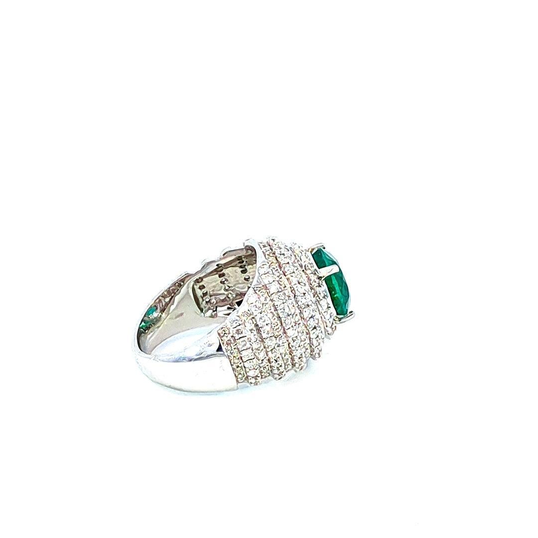 Women's 6.65 Carat Emerald And 1.53 Carat Diamond Cluster 18K Gold Ring For Sale