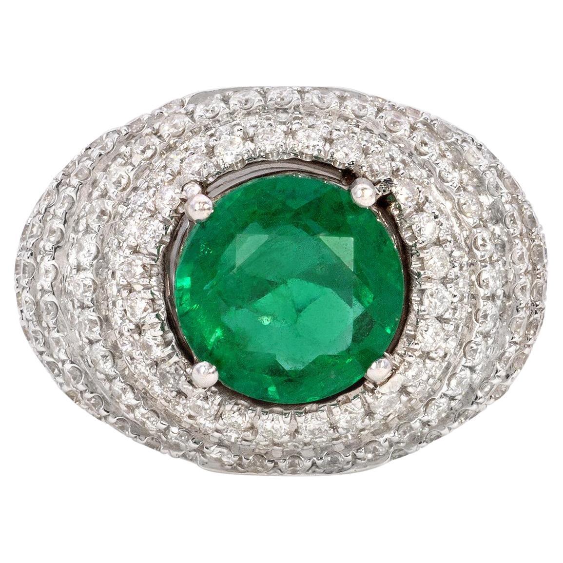 6.65 Carat Emerald And 1.53 Carat Diamond Cluster 18K Gold Ring For Sale