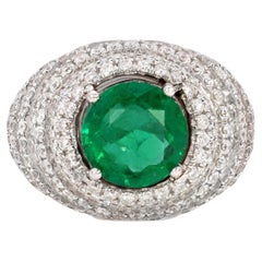 Vintage 6.65 Carat Emerald And 1.53 Carat Diamond Cluster 18K Gold Ring