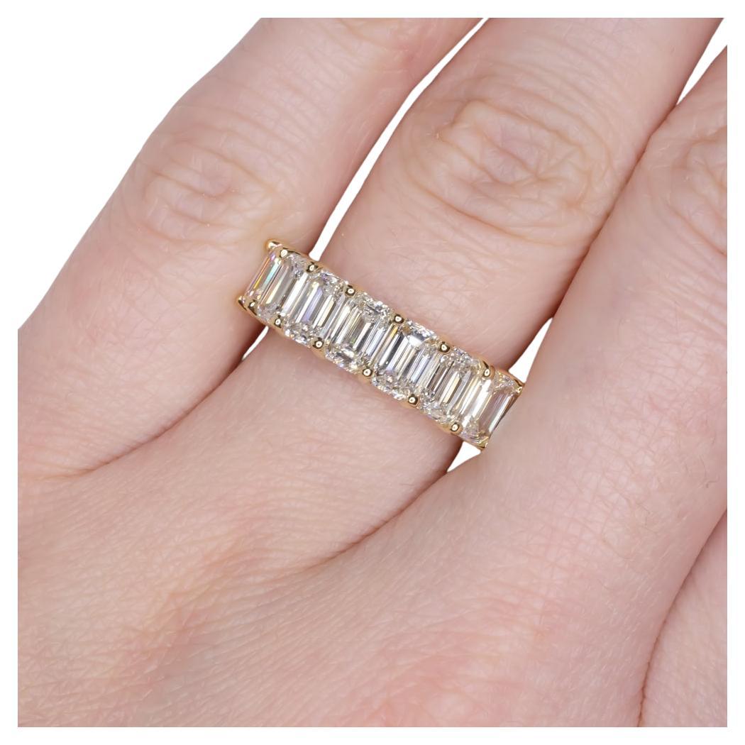 An exquisite emerald cut eternity band ring set in 14k yellow gold, each diamond weighs 0.40ct Emerald Eternity Ring
F-G color 
VVS-VS clarity grade 

