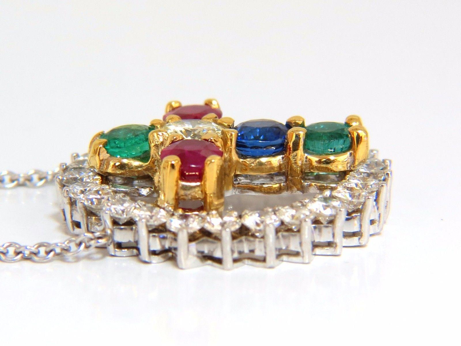 Ruby, Sapphire, Emeralds, diamond cross necklace.

Center round diamond:

.65ct.

Natural Fancy light yellow color.

Vs-2 clarity / 5.3mm

Vs-2 clarity.

3.50ct natural, ruby, sapphires & emeralds.

Clean clarity & Transparent.

2.50ct round