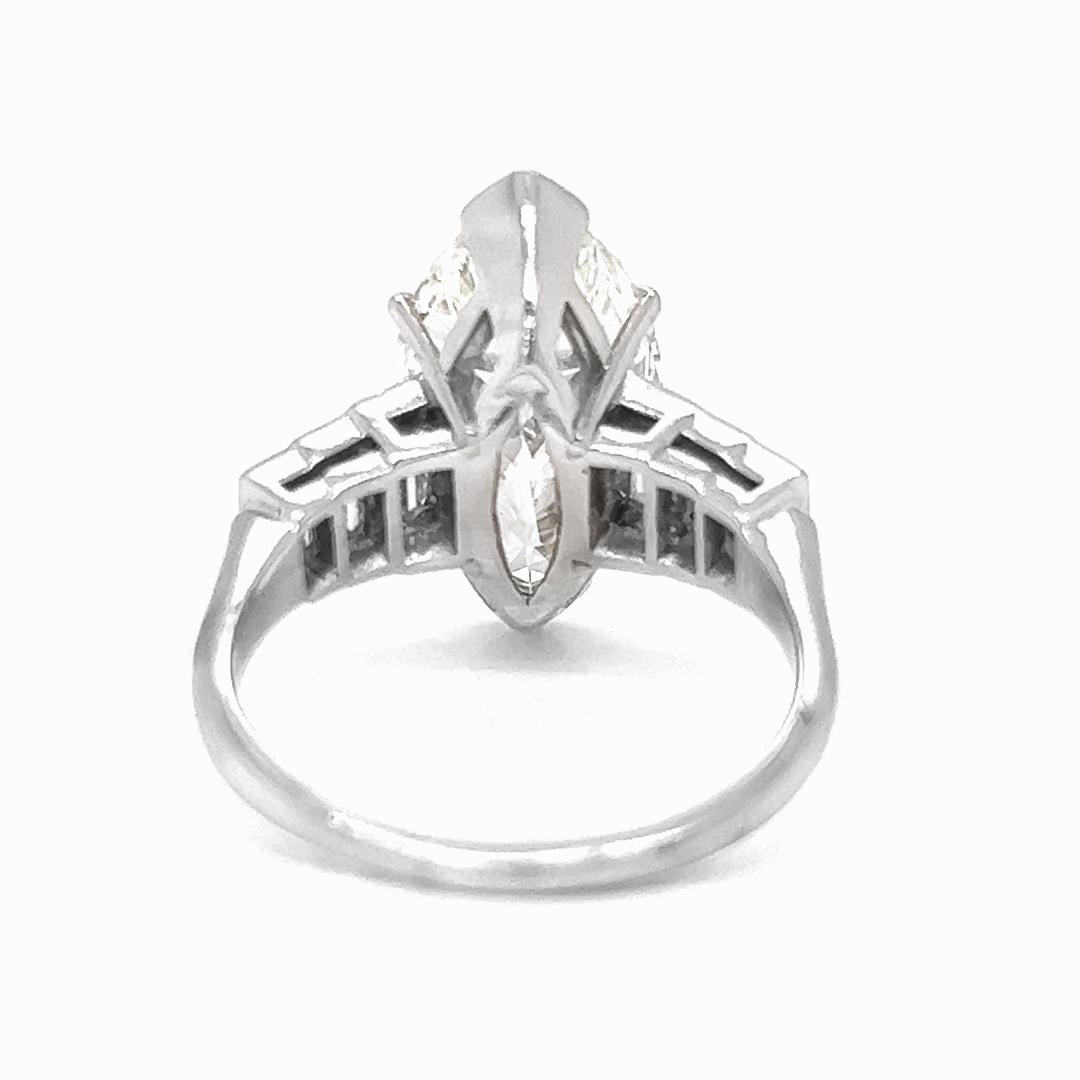 Marquise Cut 6.65 T.W Marquise/ Baguette Natural GIA Certified Diamond Platinum Ring For Sale