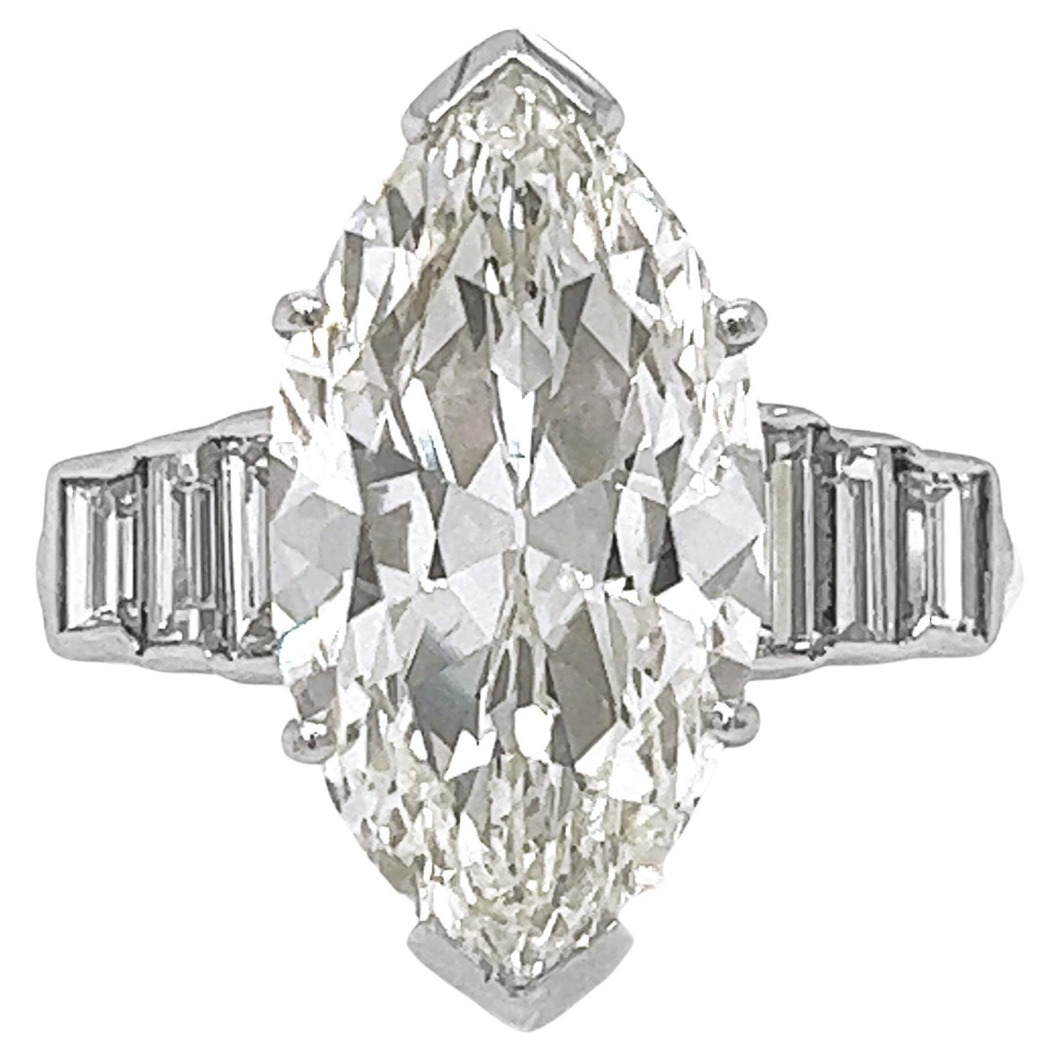 6.65 T.W Marquise/ Baguette Natural GIA Certified Diamond Platinum Ring For Sale
