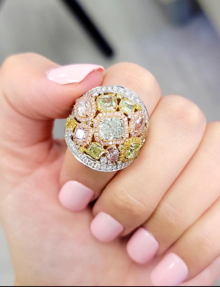 6.65CT Natural Fancy Colored Diamond Ring, 11 GIA CERTIFICATES 5.44 carats multicolor of fancy color diamonds,
11 GIA certified diamonds, ranging from 0.20 - 1.27cts, including pink, green, purple and yellow diamonds. 
1.23ct pave/side white, pink