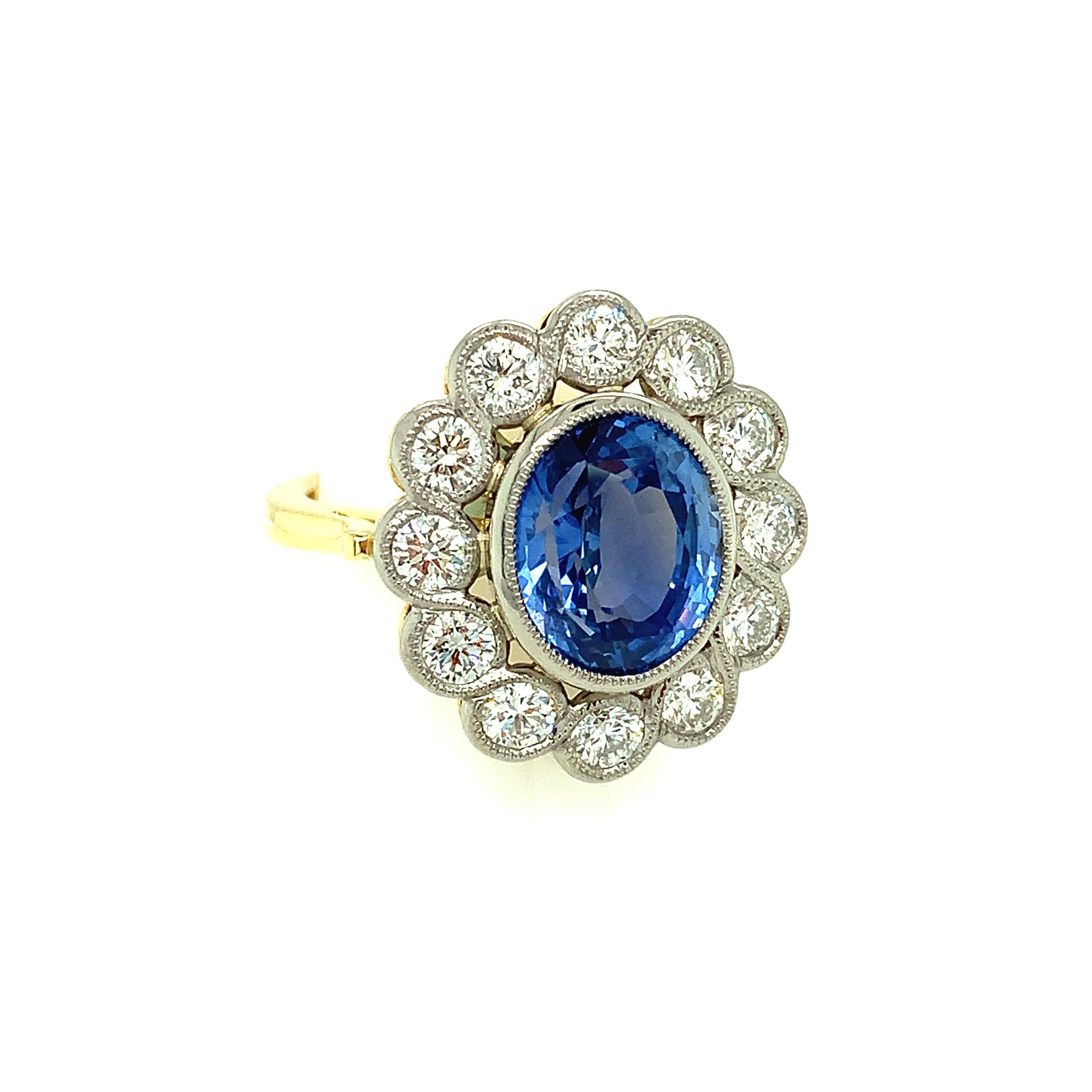 Oval Cut 6.67 Carat Cornflower Blue Sapphire and Diamond Cocktail Ring in 18k Gold For Sale