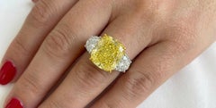 GIA Certified 6.09 Cushion Cut Fancy Intense Yellow Diamond Ring in 18K Gold