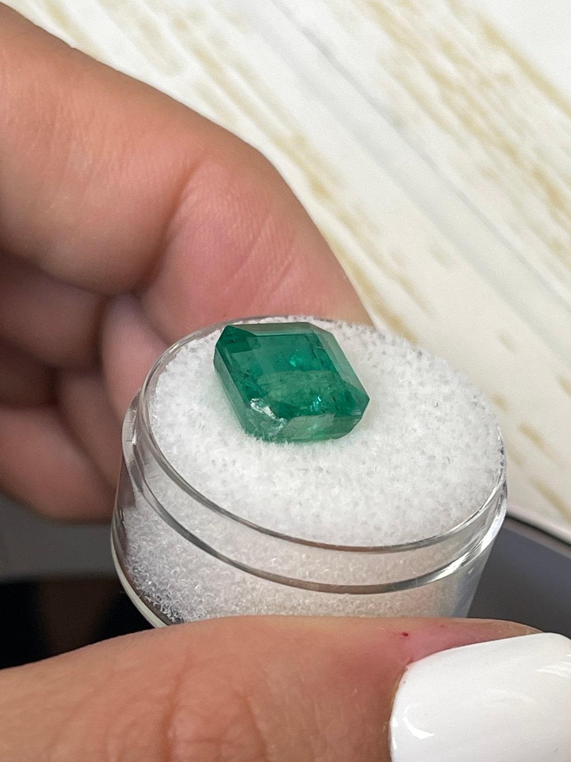Modern 6.68 Carat 10.6x10.3 Vivid Green Zambian Emerald - Emerald Cut May Birthstone For Sale